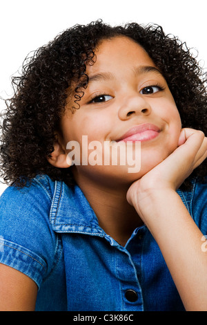 Ritratto di una ragazza smirking isolato su bianco Foto Stock