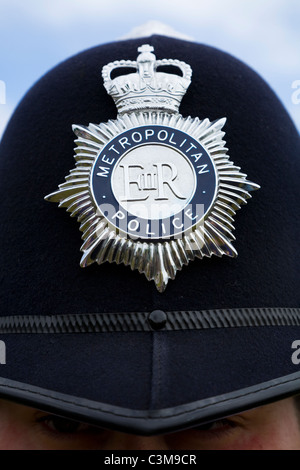 London Metropolitan / Metropolitan Police / poliziotto del casco / hat con cappuccio badge. Foto Stock