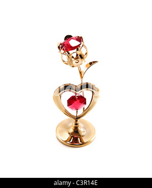 Cuore d'oro e rosa è su bianco Foto Stock