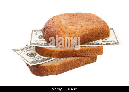 Fetta di pane con il denaro Foto Stock
