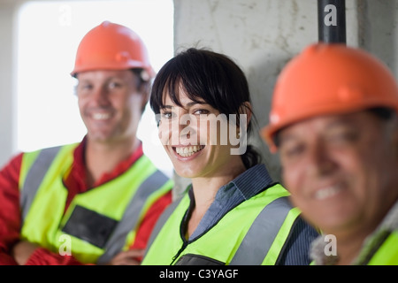 Gruppo di lavoratori sorridente Foto Stock