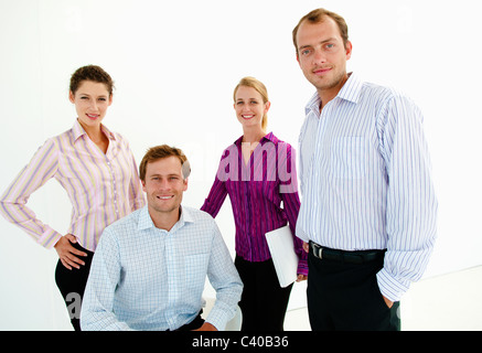 Team di quattro fiduciosi la gente di affari Foto Stock