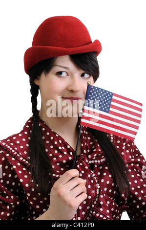 Giovane donna holding bandiera americana,isolato su bianco Foto Stock