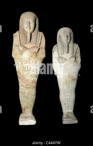 Shabti figure scolpite da calcare Foto Stock