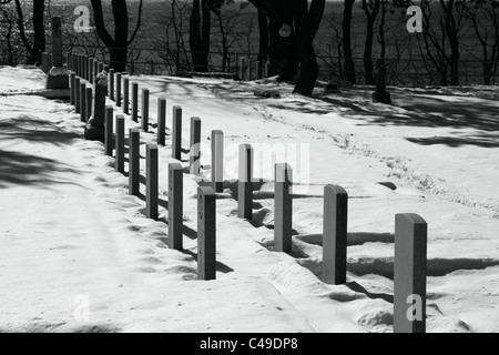 Le lapidi nella neve a Ross bay cimitero Foto Stock