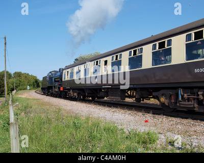 Locomotiva a vapore lasciando Watchet stazione. West Somerset Railway. Regno Unito
