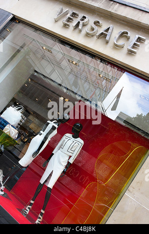 Versace uscita, situato in Sloane Street, Londra. Foto Stock