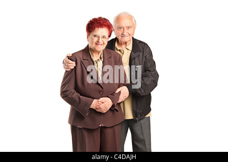 Sorridente coppia senior in posa Foto Stock