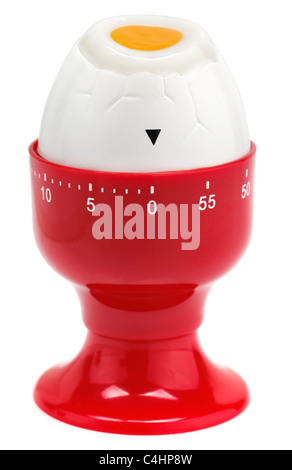 Timer di uovo a forma di un uovo in un eggcup rosso Foto Stock