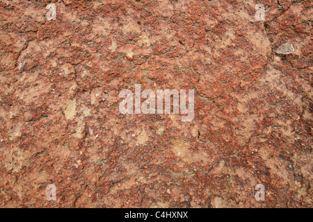 Rosso ruvido tufo vulcanico rock texture di sfondo Foto Stock