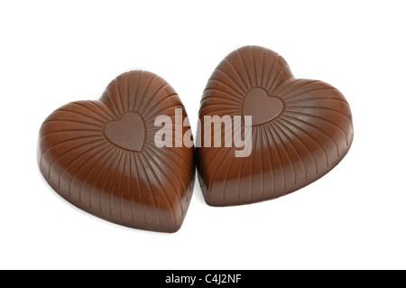 Coppia oftop vista di cioccolato a forma di cuore caramelle isolato su bianco Foto Stock