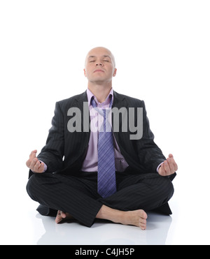 Imprenditore Meditazione yoga in Lotus Foto Stock