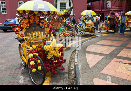 Un colorato Rickshaw in Malacca, Malesia Foto Stock