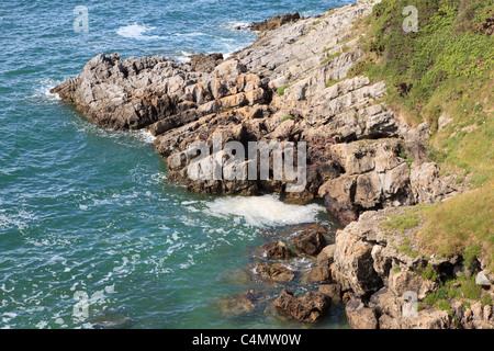 Langland Bay, Gower, Swansea, South Wales, Regno Unito su un giorno d'estate con un cielo blu Foto Stock