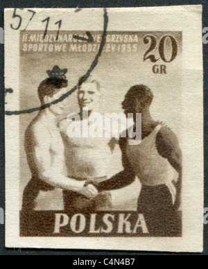 La Polonia 1955: un timbro stampato in Polonia, dedicato alla seconda Internazionale Giochi della Gioventù (africani, europea e asiatica) Foto Stock