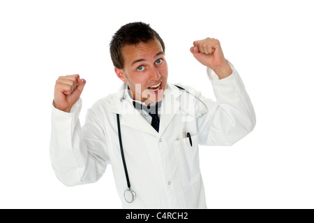Giovane maschio medico con le mani sollevate a suon di pugni Foto Stock