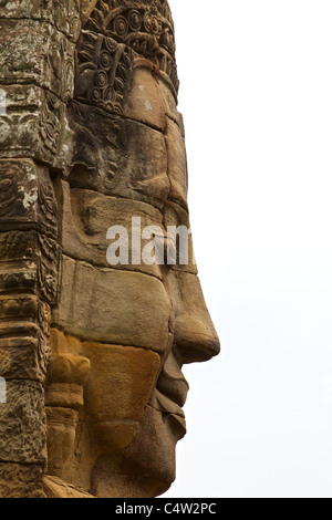 Faccia di pietra sul tempio Bayon ad Angkor Thom, Cambogia Foto Stock