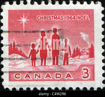 CANADA - circa 1964: un timbro stampato in Canada mostra famiglia e la Stella di Betlemme, circa 1964 Foto Stock