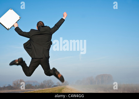 Businessman Jumping Foto Stock