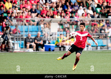 Mahathir Azeman di Singapore U15 in azione durante il ventitreesimo Canon Lion City Cup Foto Stock