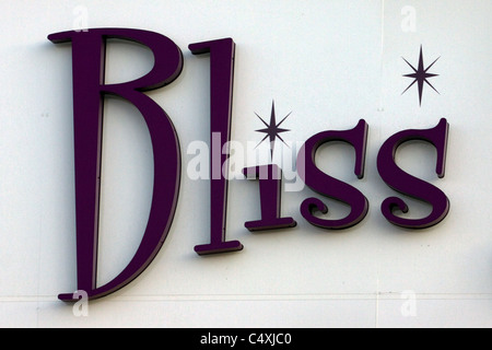 Un segno su una parete Bliss Foto Stock