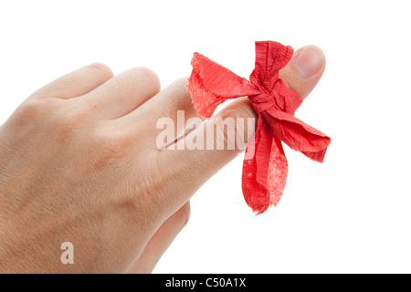 Arco rosso sul dito close up Foto Stock