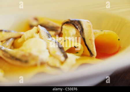 In prossimità di pesce e piatti di pasta Foto Stock