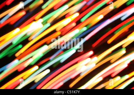 Bande di diversi colori rosso blu verde giallo arancione su sfondo nero Foto Stock