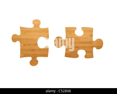 Puzzle in legno pezzi isolati contro uno sfondo bianco Foto Stock