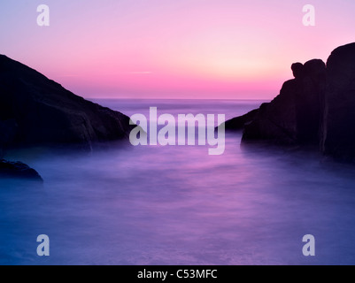 Tramonto in grotta. Puzzava Sands State Park, Oregon Foto Stock