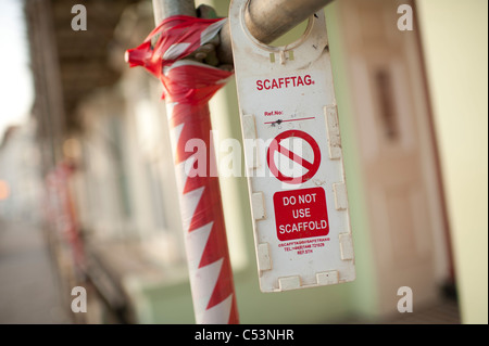 Scafftag - un avvertimento Danger Unsafe Non utilizzare tag di impalcatura su ponteggi, REGNO UNITO Foto Stock