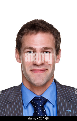 Foto di un imprenditore con una felice espressione sul suo volto, headshot isolato su uno sfondo bianco. Parte di una serie. Foto Stock