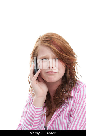 Ragazza su un telefono cellulare Foto Stock