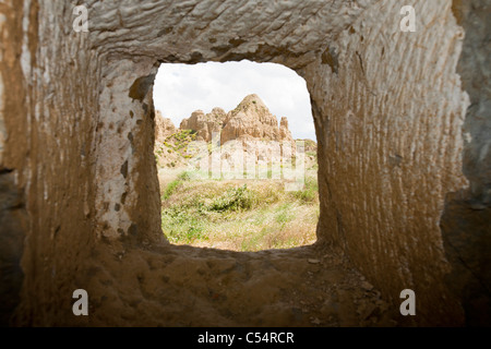 Grotta di vecchie case in Guadix, Andalusia. Fino a 10.000 persone vivono ancora in raffreddare case sotterraneo scavato nella roccia, Foto Stock