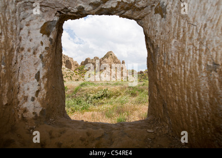 Grotta di vecchie case in Guadix, Andalusia. Fino a 10.000 persone vivono ancora in raffreddare case sotterraneo scavato nella roccia, Foto Stock