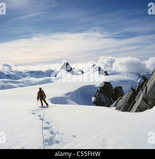 Nuova Zelanda, Isola del Sud, Sud Westland, Alpi del Sud, turistico a piedi attraverso la neve Foto Stock