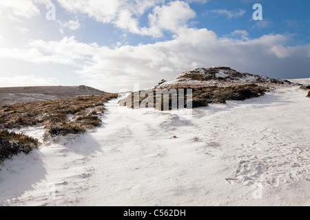 Dartmoor nella neve vicino a Saddle Tor, Devon, Inghilterra, Regno Unito Foto Stock