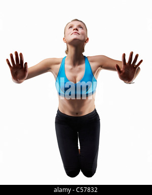 Donna facendo ups push Foto Stock