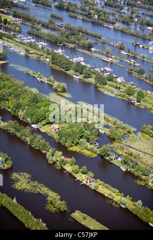 I Paesi Bassi, Breukelen, Dugged fuori terra nella palude. Sport acquatici. Alloggiamento case vacanze. Antenna. Foto Stock