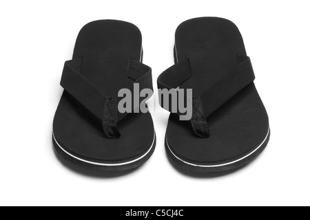 Coppia di nero flip flop calzature casual su sfondo bianco Foto Stock