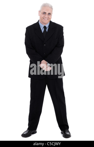 Isolato bello maturare il business man standing isolato su sfondo bianco Foto Stock