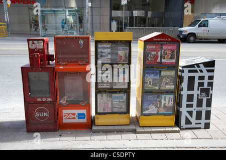 Giornale gratuito e pagato le caselle vending toronto ontario canada Foto Stock