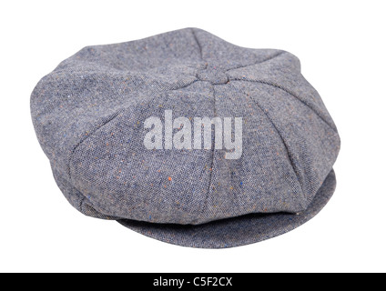 Tweed maschili guida piatta cappello indossato sulla testa quando si è fuori per un drive - percorso incluso Foto Stock
