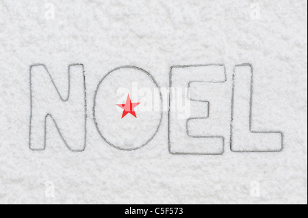 NOEL . Lettere a stella e neve Foto Stock