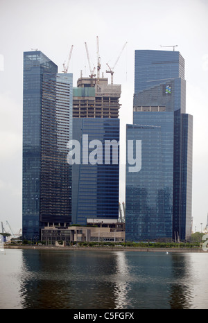 Grattacieli in costruzione nella Marina Bay, Singapore Foto Stock