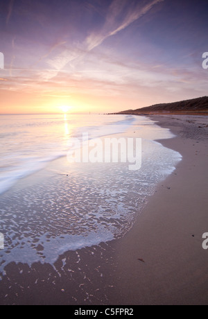 Waxham spiaggia al tramonto sulla costa di Norfolk Foto Stock