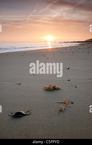 Waxham spiaggia al tramonto sulla costa di Norfolk Foto Stock
