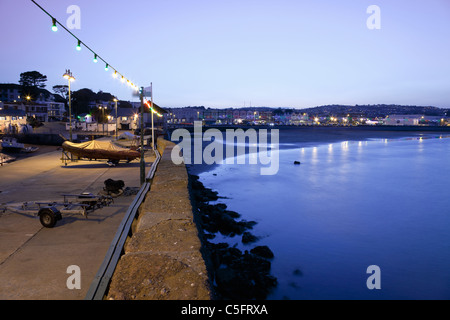 Paignton Seafront al tramonto dal porto, Paignton, Devon, Inghilterra, Gran Bretagna Foto Stock