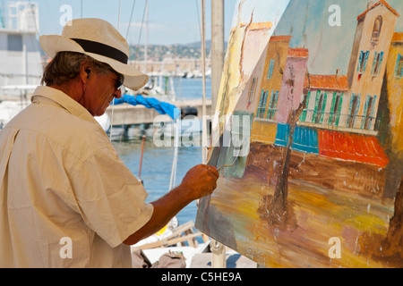 La pittura dell'artista nella vista di Saint Tropez, Costa Azzurra, Provenza, Francia. Foto Stock