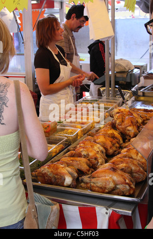 Pressione di stallo di mercato nella vendita di Versailles rotisserie polli Foto Stock